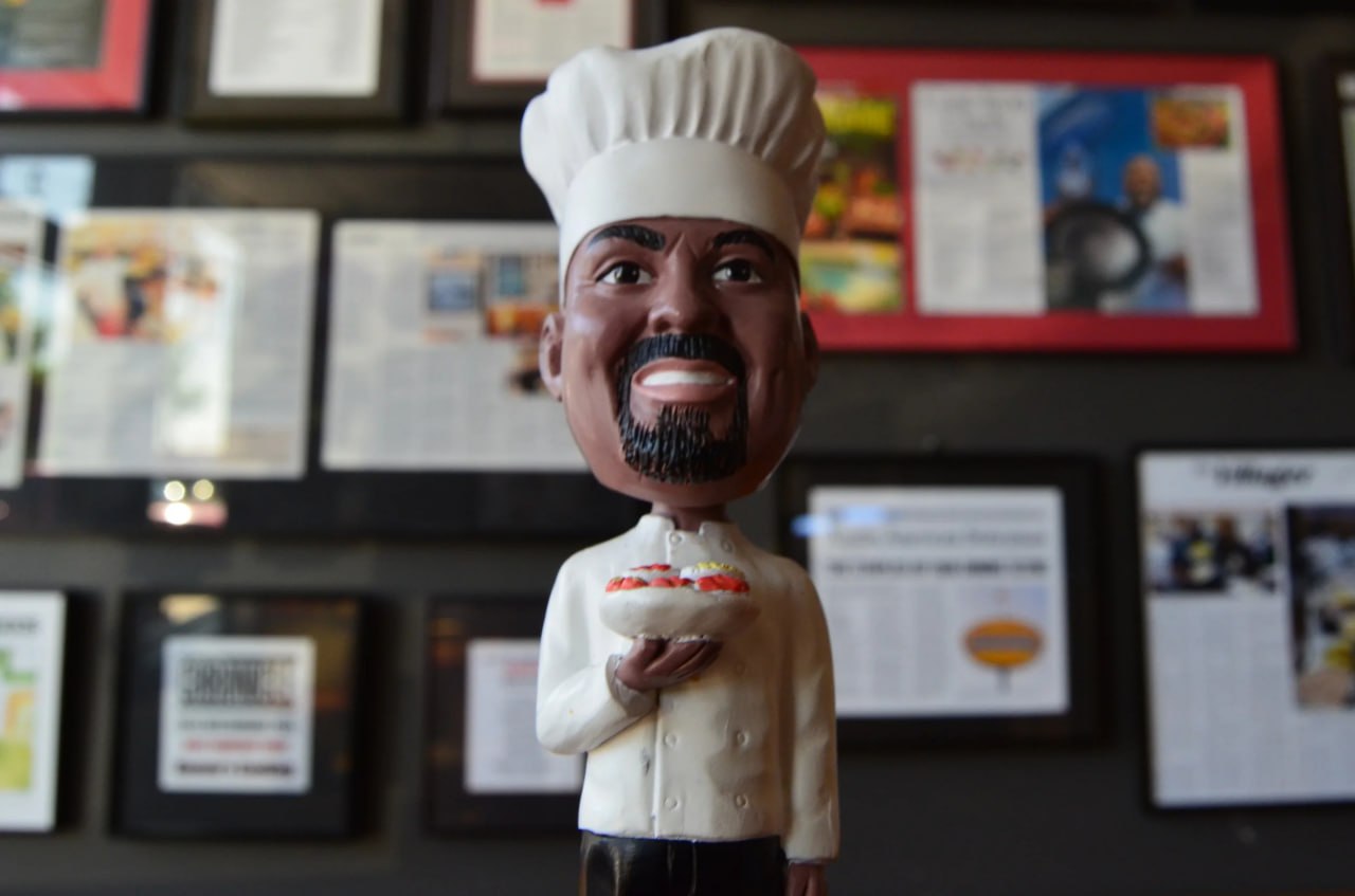 Hoover bobblehead holding a plate